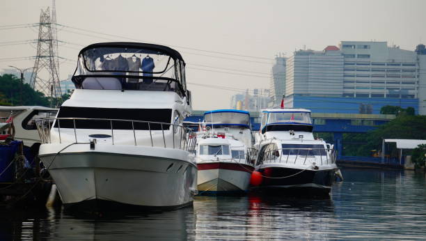 Jakarta, Indonesia - 29 November 2023 : Speed boat anchored at the Marina