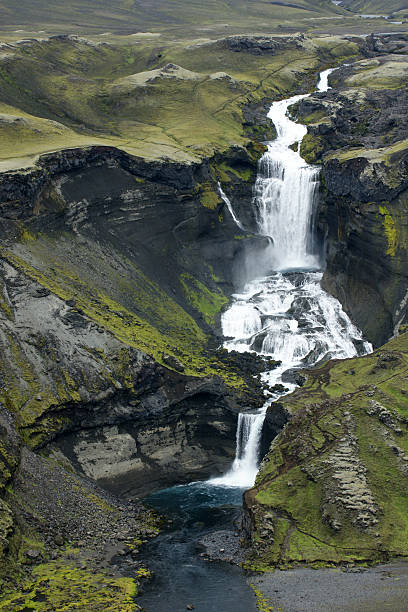 istock Waterfall in a volcanic landscape, Iceland. 182420836