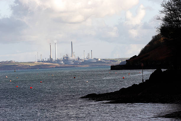 Oil refinery by the sea Oil refinery by the sea milford haven stock pictures, royalty-free photos & images