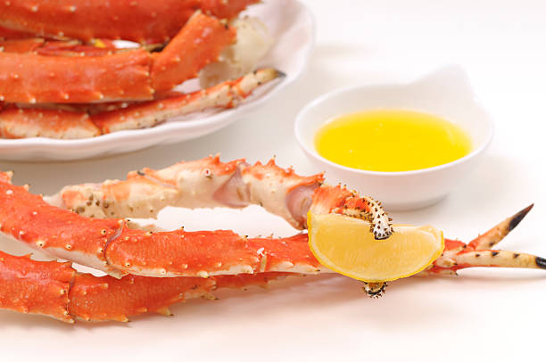 istock Crab legs served with lemon and butter 182420905