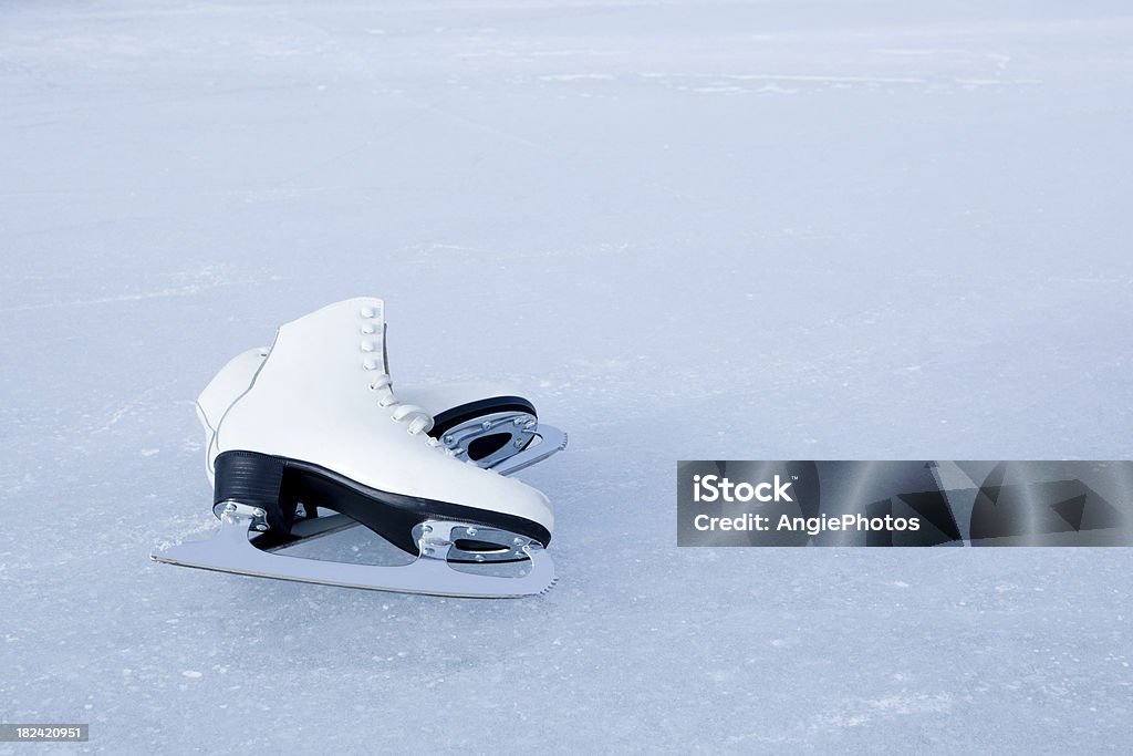 Ice skates Ice skates on ice Figure Skating Stock Photo