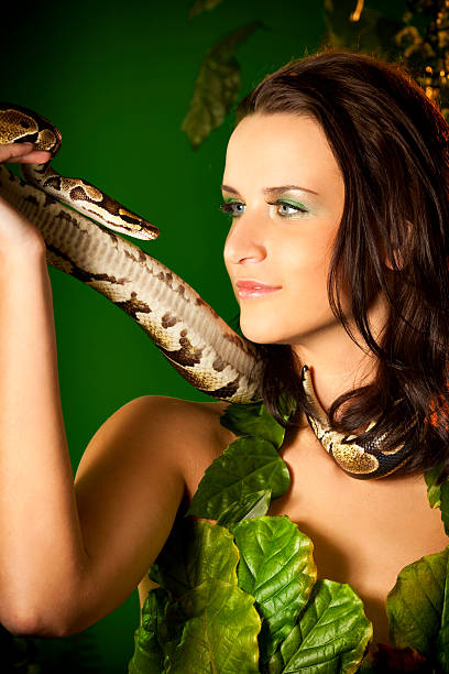 istock Women and Snake portrait 182420972