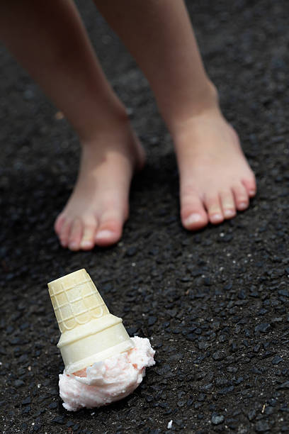 istock Dropped Ice Cream and Feet 182421191