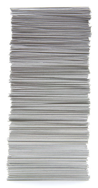 istock Large stack of hand trimmed cards on a white background 182421372