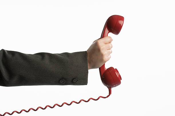 Hand holding old vintage phone