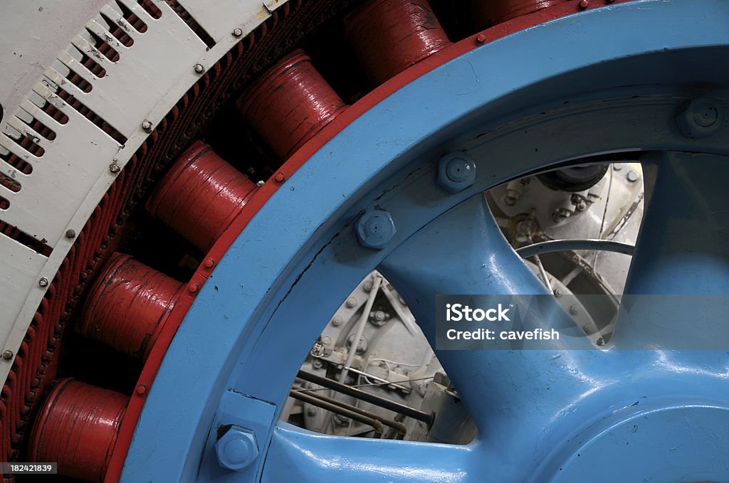 Bright Coloured Hydroelectric Generator Rotor "A bright blue rotor and red stator from a hydroelectric generating plant.  Recently decommissioned, this generator was built in 1930 and used up until 1999.    Located at Stave Lake Falls electric power station." Generator Stock Photo