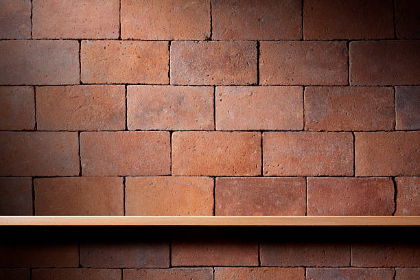 istock Shelf on the wall of bricks 182422174