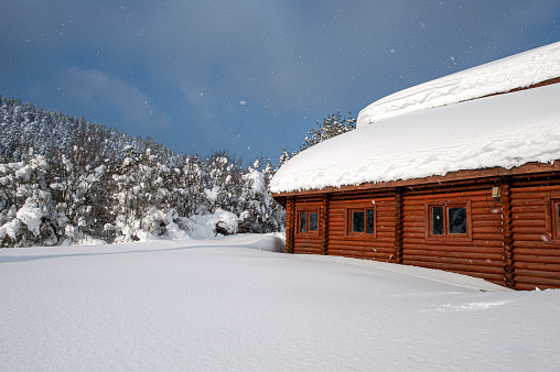 Wooden mountain hut in Abant in winter