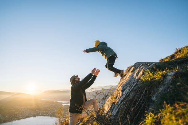 istock Family enjoys time together on mountain top 1824224566