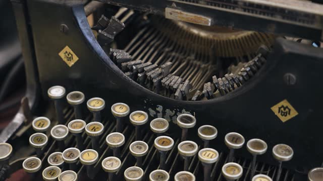 Close-up of the details and mechanism of an antique typewriter. A very beautiful antique object