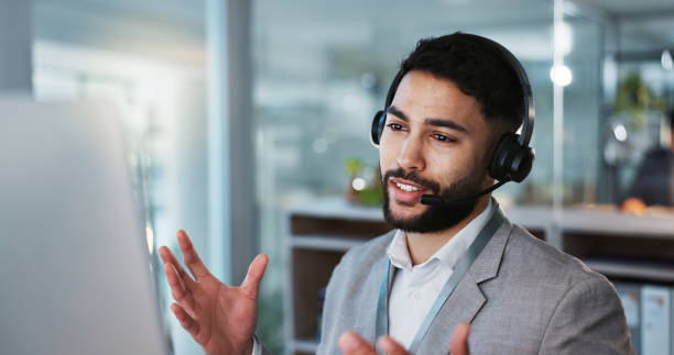 istock Computer, call center and man talking to customer service, crm support or contact us at help desk for inbound marketing. Communication, telemarketing and sales agent chat to client in lead generation 1824229891