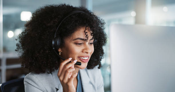 istock Computer, call center and funny woman talking in customer service, tech support and contact us at help desk. Communication, telemarketing and happy sales agent laughing, consulting and crm advisory 1824229892