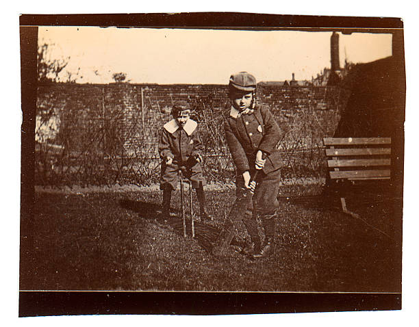 istock Little boys playing cricket 182423002