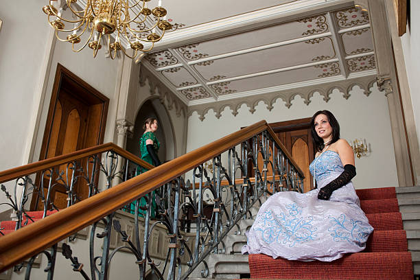 istock Two woman sitting on stairs 182423388