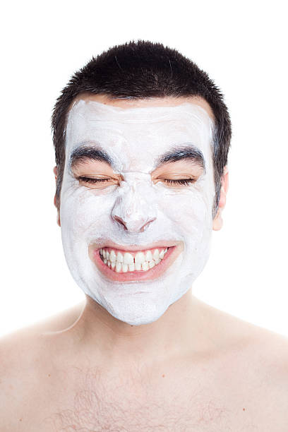 istock Man With Facial Mask Smiling 182424651