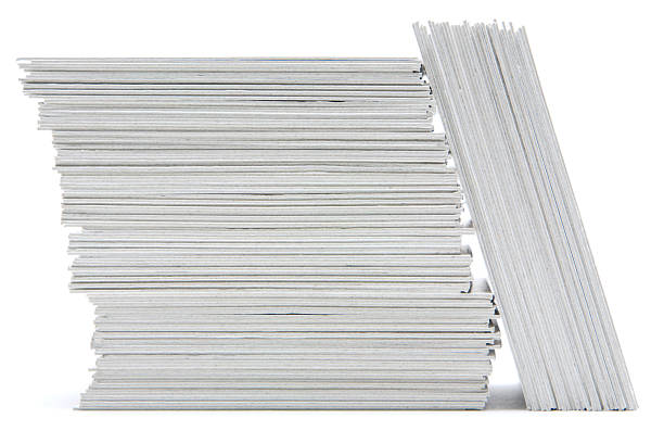 istock Stack of hand trimmed cards on white 182424707