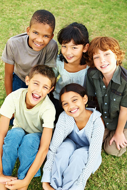 istock Group of young kids having fun 182425629