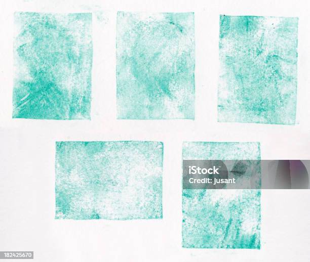 A Collection Of Blue Letterpress Printed Square Shapes Stock Photo - Download Image Now