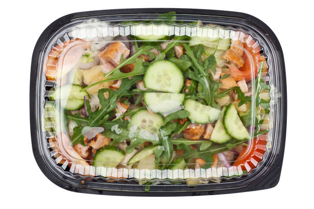 Chicken salad in plastic takeaway container stock photo