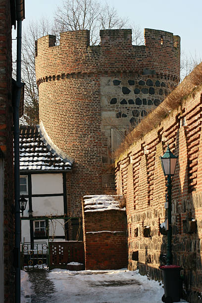 istock medieval watch tower and town wall 182426020