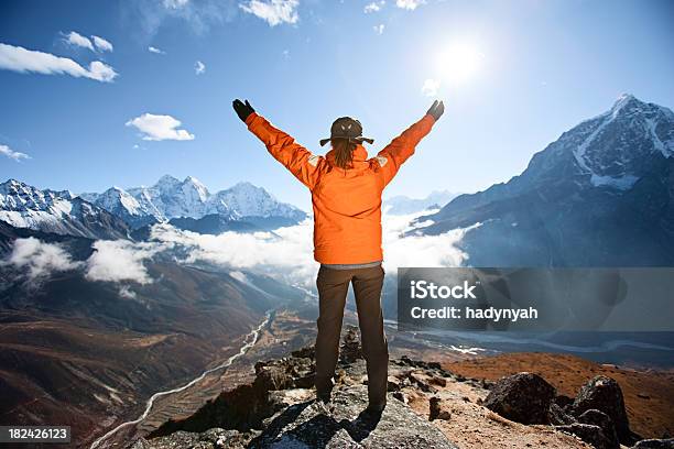 Woman Lifts Her Arms In Victory Mount Everest National Park Stock Photo - Download Image Now