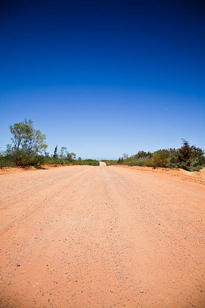 Country Road Australia Red Continent "red continent, country road under deep blue summer sky. western australia." exmouth western australia photos stock pictures, royalty-free photos & images