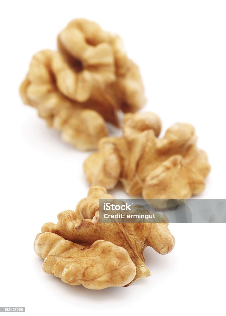 Walnuts isolated on white - vertical Walnuts isolated on white - vertical.My other similar images: Walnut Stock Photo