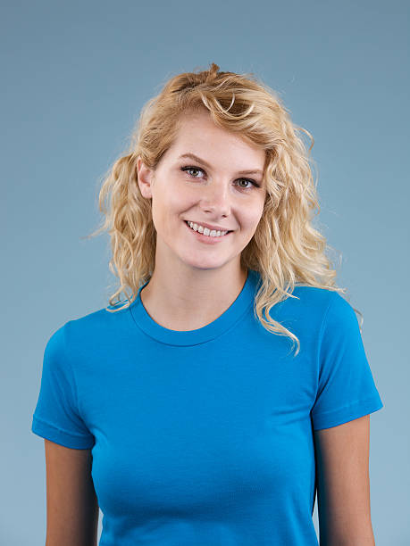 istock Young blonde woman with blue shirt 182427140