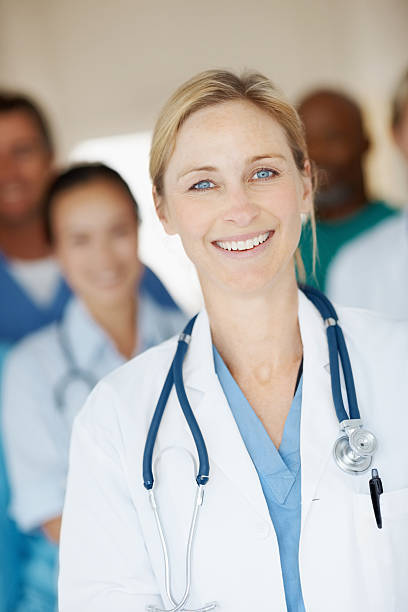 istock A young female doctor smiling at the camera 182427548