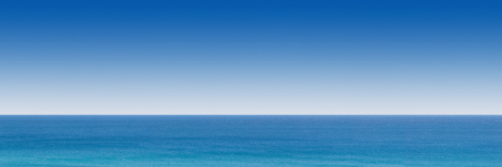A wide angle panorama of a vast blue ocean.Made from several 1Ds MkIII images stitched together.