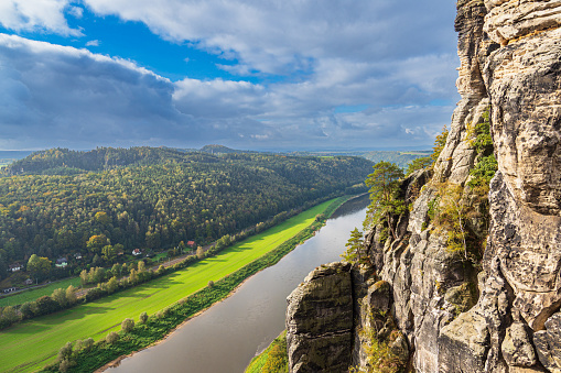 View over the river Elbe to the Saxon Sandstone Mountains, Germany.