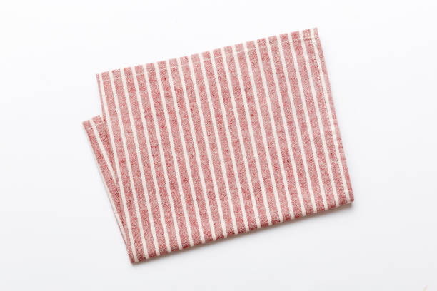 istock top view with red empty kitchen napkin isolated on table background. Folded cloth for mockup with copy space, Flat lay. Minimal style 1824279565