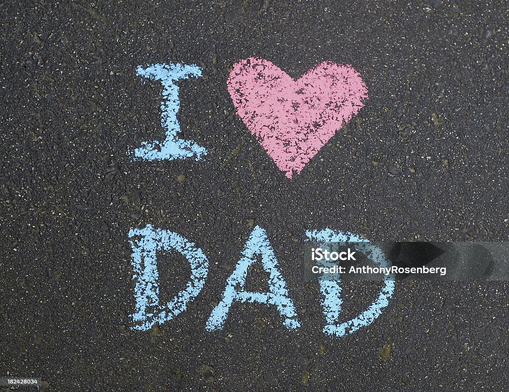 I heart Dad chalkboard writing I love Dad written out in sidewalk chalk on pavement.  See also Father's Day Stock Photo