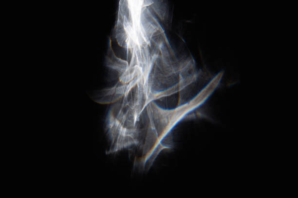 istock Flare of light reflected from the crystal Abstract design on black background. Close-up. 1824287932