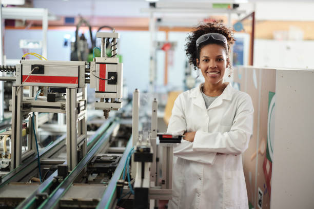 istock Happy black scientists with crossed arms in a lab. 1824288969