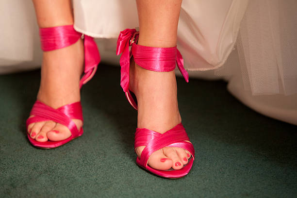 Bride in Hot Pink Shoes stock photo