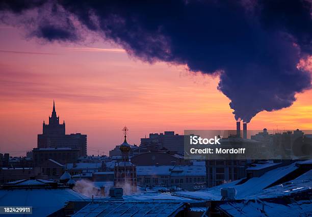 Winter Cityscape With Steam Emissions And Industrial Pollution Stock Photo - Download Image Now