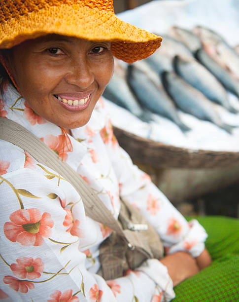 istock Cambodian Fish Market Seller 182429922