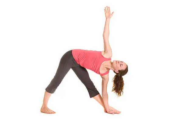 Woman doing yoga. Isolated on white background.