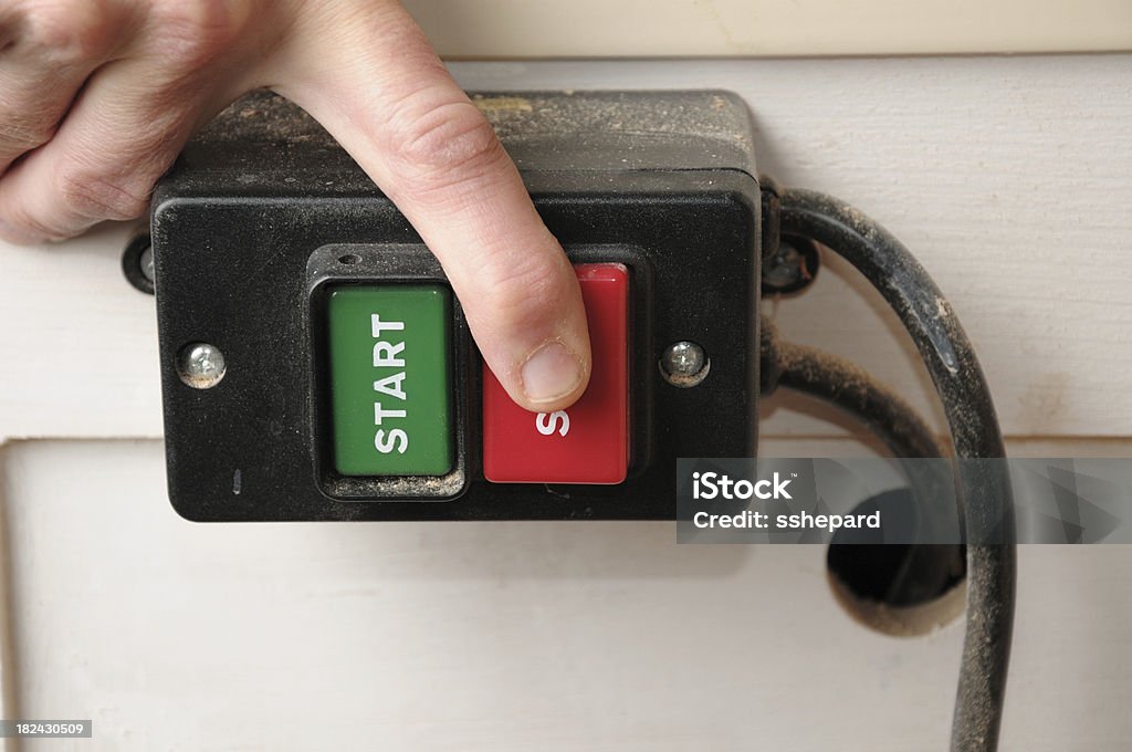 Pressing stop button Close up of person pressing stop button with copy space Beginnings Stock Photo