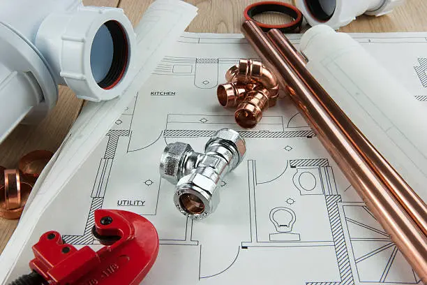 Photo of A plumbing diagram with copper pipe, tubing and fixings