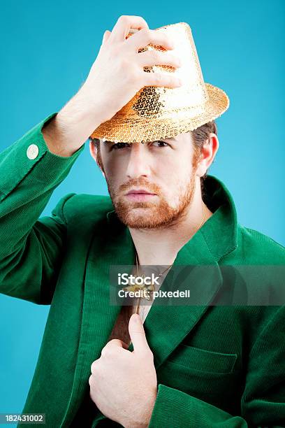 Slick Pimp With Green Jacket And Sequined Hat Stock Photo - Download Image Now - Men, Cool Attitude, Gold - Metal