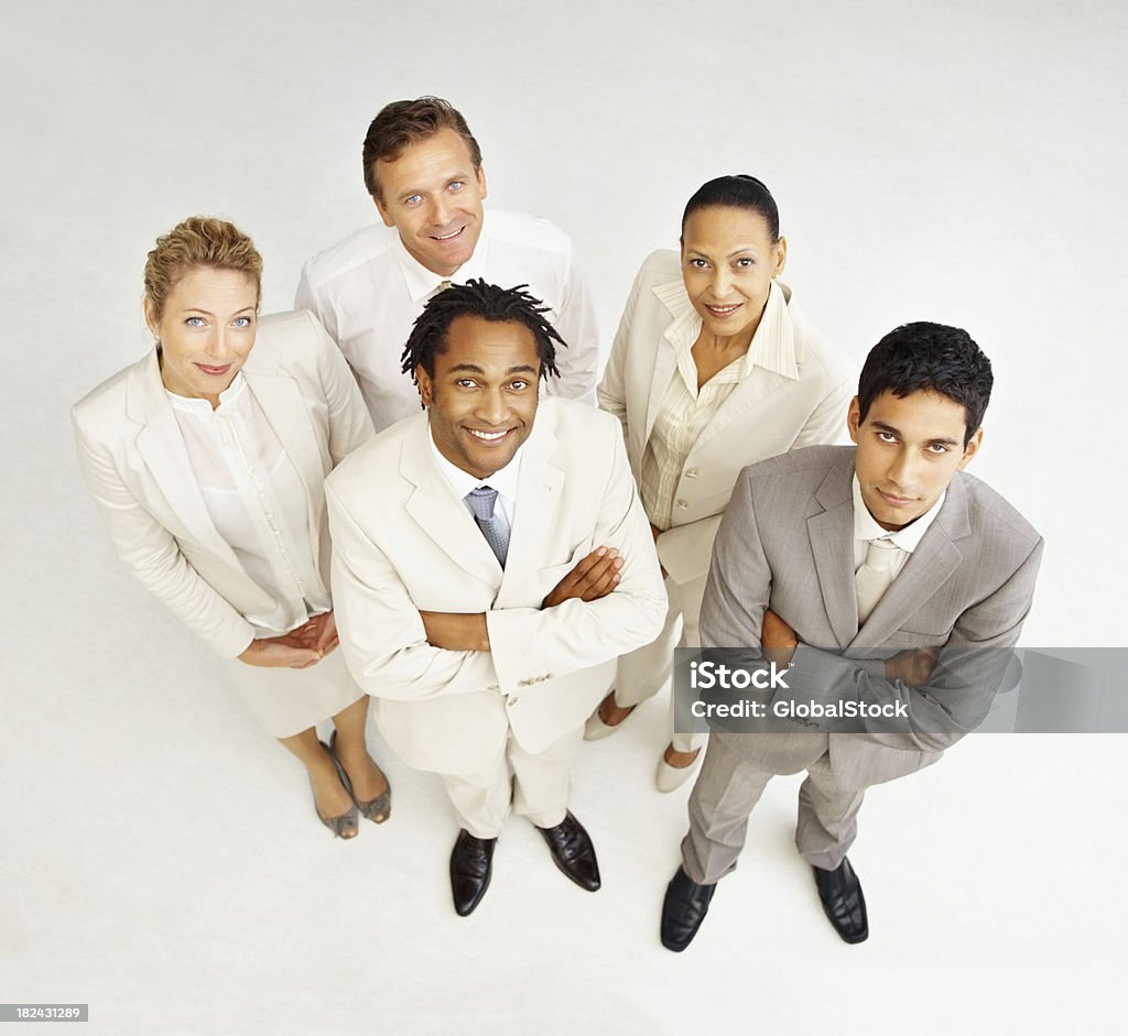 Top view of business colleagues standing together Top view of a group of happy business colleagues standing together 20-24 Years Stock Photo