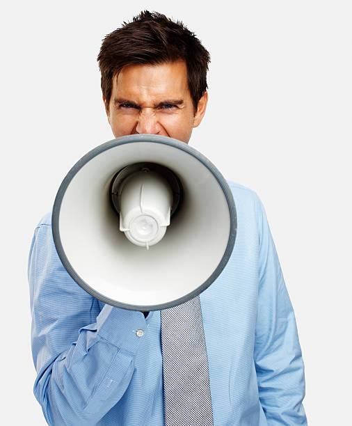 uomo d'affari urlando nel megafono - complaining attitude megaphone business foto e immagini stock