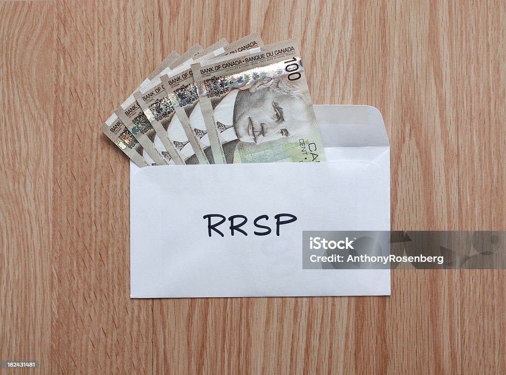 RRSP 寄与度 - 100カナダドル紙幣のロイヤリティフリーストックフォト
