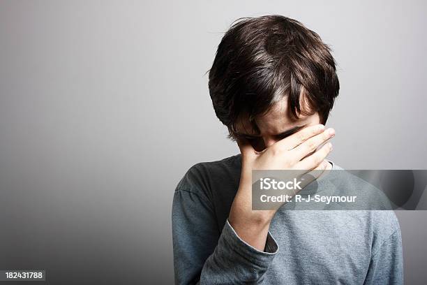 Depression Stock Photo - Download Image Now - Teenage Boys, Crying, Head In Hands