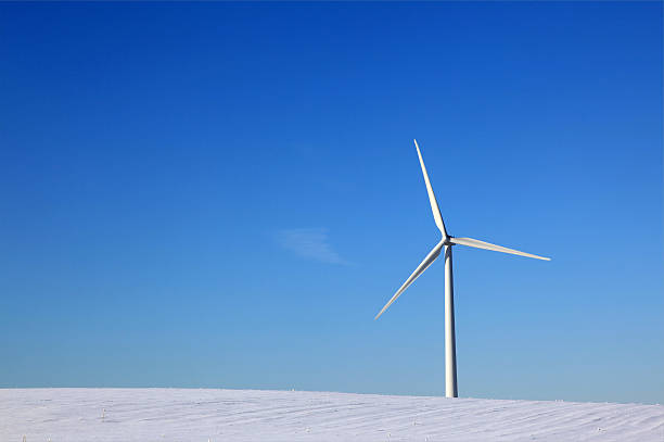 istock Wind turbine in a wind-farm generating alternative energy 182432150