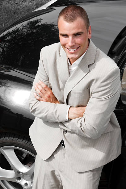 istock Businessman near his new car 182432443