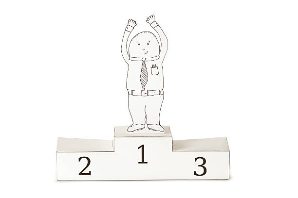 Office winner White collar worker paperdoll in a handmade paper podium celebrating his victory. This is an exclusive image and it can only be downloaded in istockphotoThis image is available in high resolution.Please see some similar pictures from my portfolio: doing the wave stock illustrations