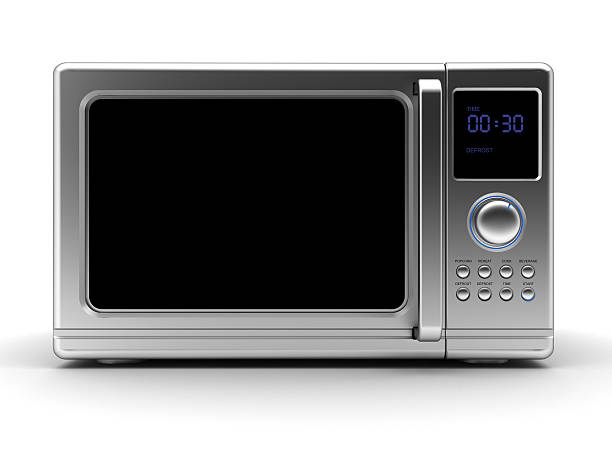 Single metallic gray microwave with black elements stock photo